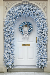 150cm Wide Single Curved Christmas Door Arch - Snow Flocked - Pre-Lit Ice White